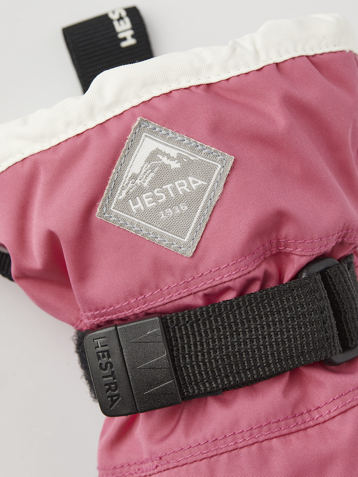 Hestra Gauntlet CZone Jr 3-finger gloves, pink cuff with Hestra patch and black strap