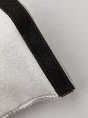 Hestra kids' glove liner cuff in dark fabric with stitched edge on off-white fleece