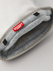 Off-white ski glove liner with gray fleece lining and stitched inner label
