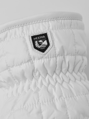 White mitten with Hestra logo patch on wrist cuff and stitched quilt pattern