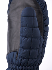 Blue mitten with quilted padding and gathered cuff at wrist opening
