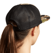 Women's dark mesh trucker hat with adjustable strap and camo brim, angled side view
