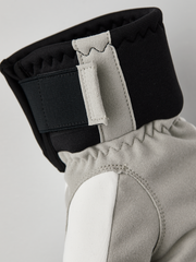 Hestra comfort tracker mittens in black and off-white with light gray palm panel