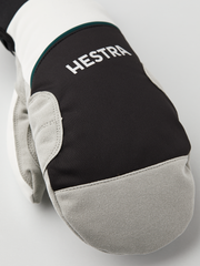 Hestra comfort tracker mittens with black back and off-white Hestra logo patch