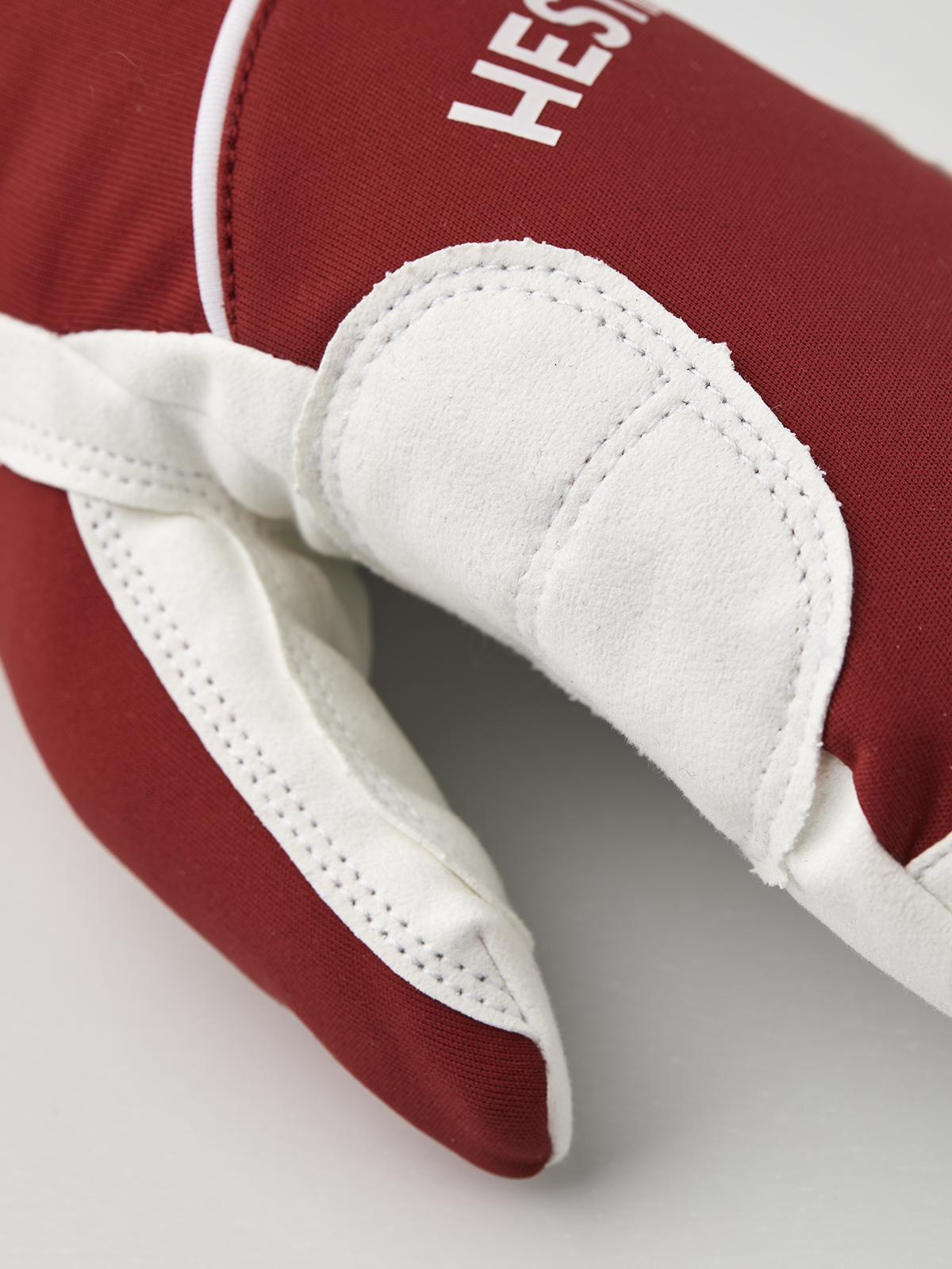 Hestra comfort tracker mittens in red with off-white finger panels