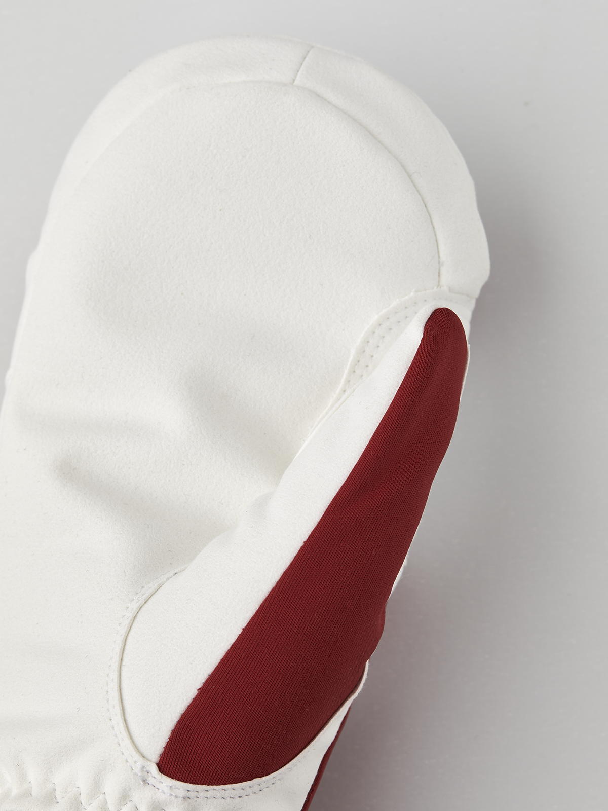 Hestra comfort tracker mittens in off-white with red side panel