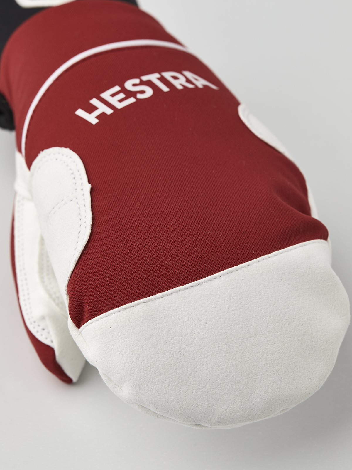 Hestra comfort tracker mittens in red with off-white insulated palm and cuff