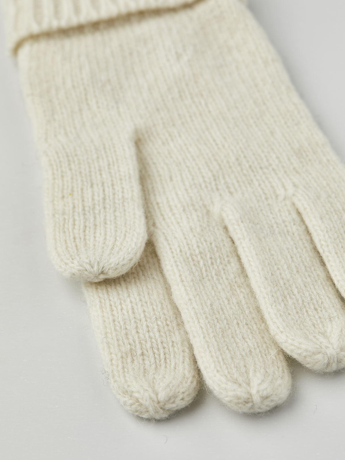 Off-white knit glove liner fingertips and ribbed cuff