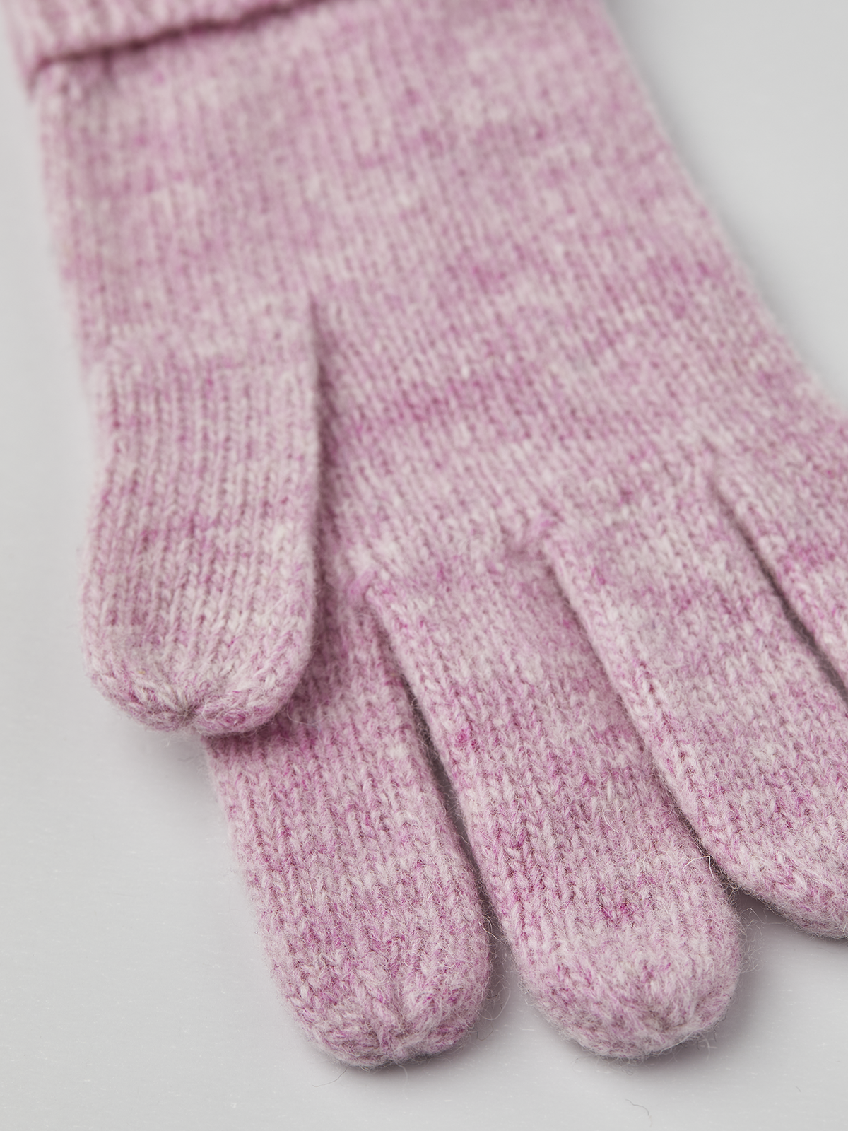 Pink knit glove liner fingertips with ribbed knit texture