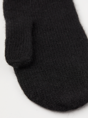 Black knit mitten liner with ribbed cuff, close-up.
