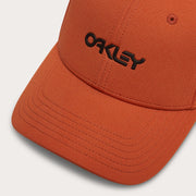 Orange stretch cap close-up with Oakley lettering on front panel