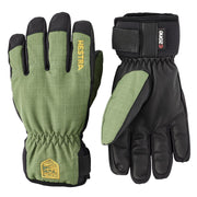 Youth waterproof Hestra gloves in green with black textured back and elastic wrist