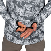 Mens hooded sun shirt close-up: gray floral palm print with black trim cuffs and logo
