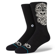 Black crew socks with white cartoon face graphic and small blue stripe at toe