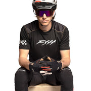 Black short-sleeve jersey with white front logo and checkered sleeve panel