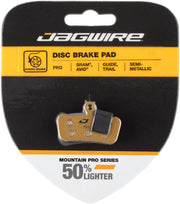 Semi-metallic disc brake pads set with metal backing and mounting hardware