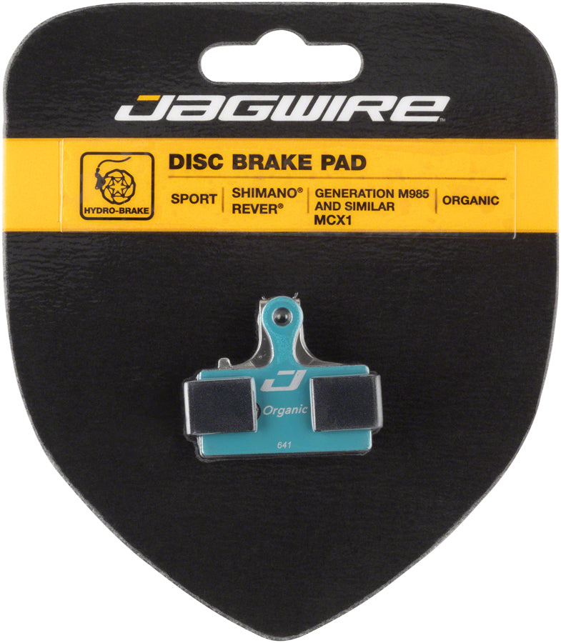 Jagwire organic disc brake pads in blister pack, black and blue backing