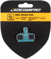 Jagwire organic disc brake pads in blister pack, black and blue backing