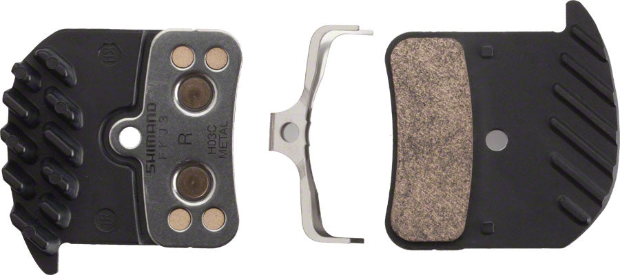 Metal-backed disc brake pads with finned aluminum backplate, one pair