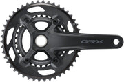 Black Shimano GRX double chainring crankset with Hollowtech II spindle interface