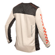 Cream long-sleeve cycling jersey back view with black panels and Fasthouse logo