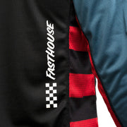 Side detail of long-sleeve jersey sleeve with white check logo and red mesh panel
