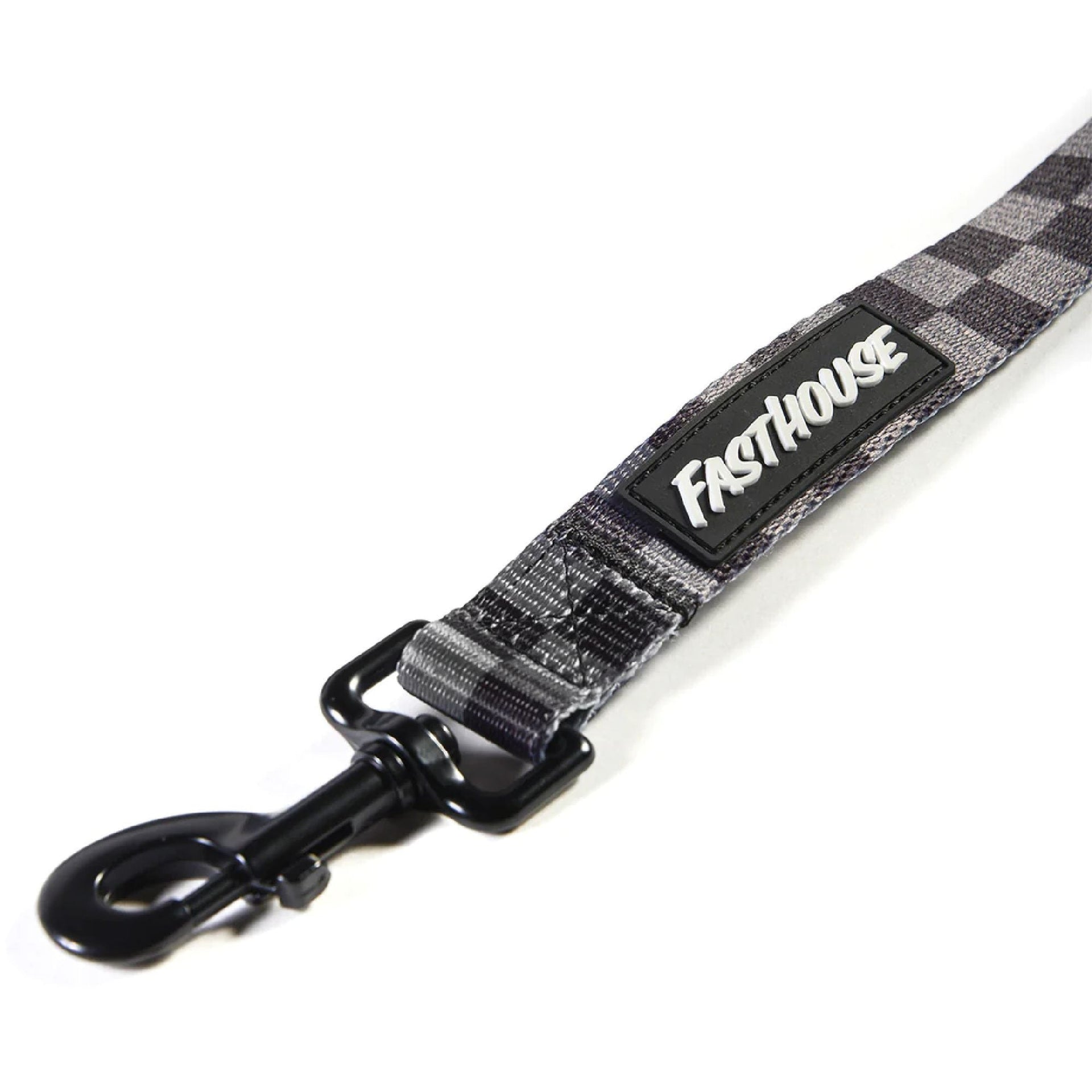 Checker-pattern dog leash close-up with Fasthouse label and black metal clip