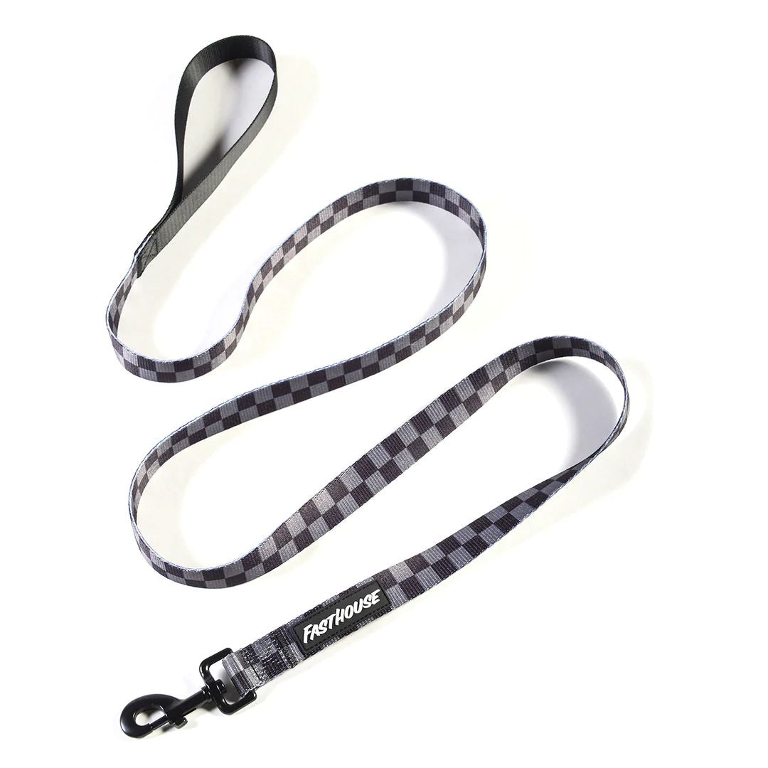 Plaid dog leash with black and white checkers, black metal clip and Fasthouse label