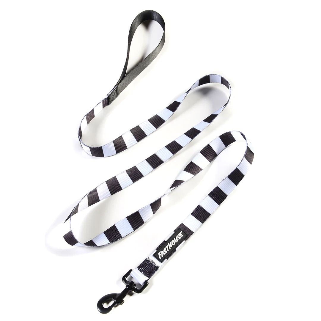 Black and white checker-striped dog leash with black metal clip and Fasthouse label