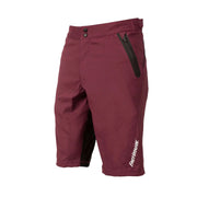 Youth maroon riding shorts with side zip pocket and black cuff logo patch.