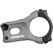 Bike stem in dark gray with clamp hardware and side bolt details