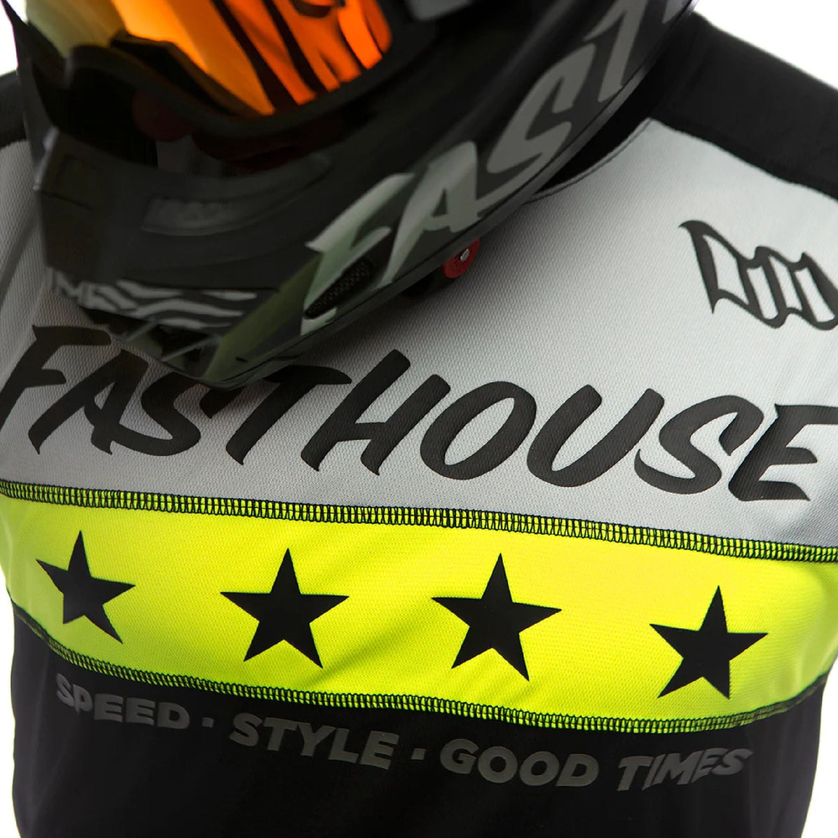 Neon yellow stripe cycling jersey front with stars and 'SPEED STYLE GOOD TIMES'.