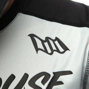 White jersey panel with large black 'Fasthouse' logo.