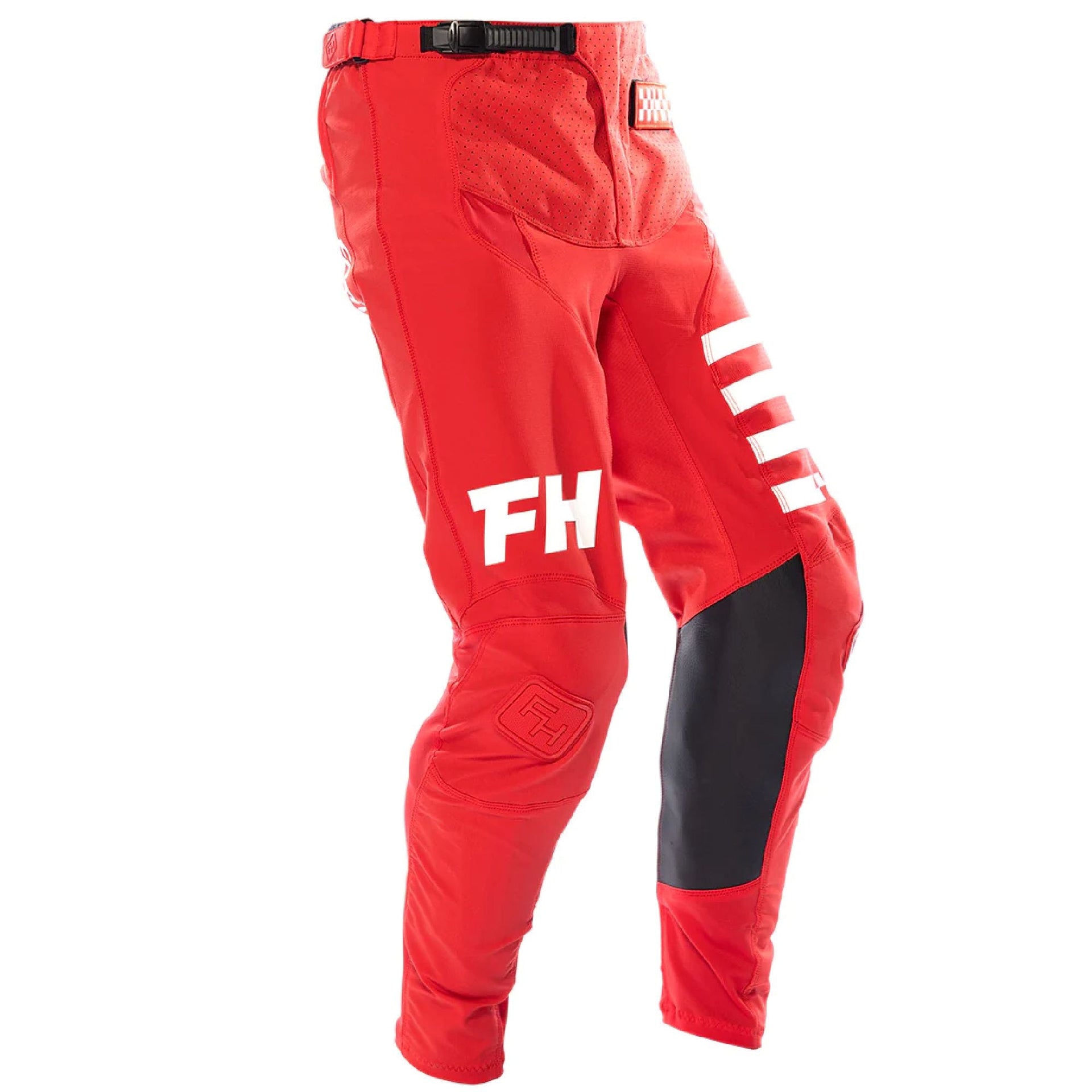 Red riding pants with FH logo, black side panels, and white reflective stripe on thigh.