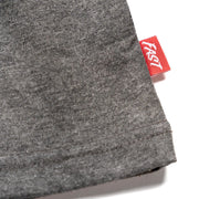 Heather gray tech tee cuff close-up with red brand tag