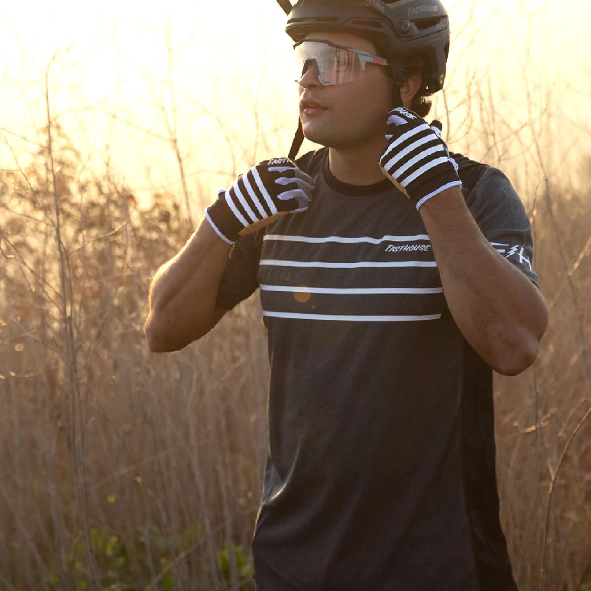 Men's short-sleeve jersey in dark heather navy with white stripe graphics and small logos.