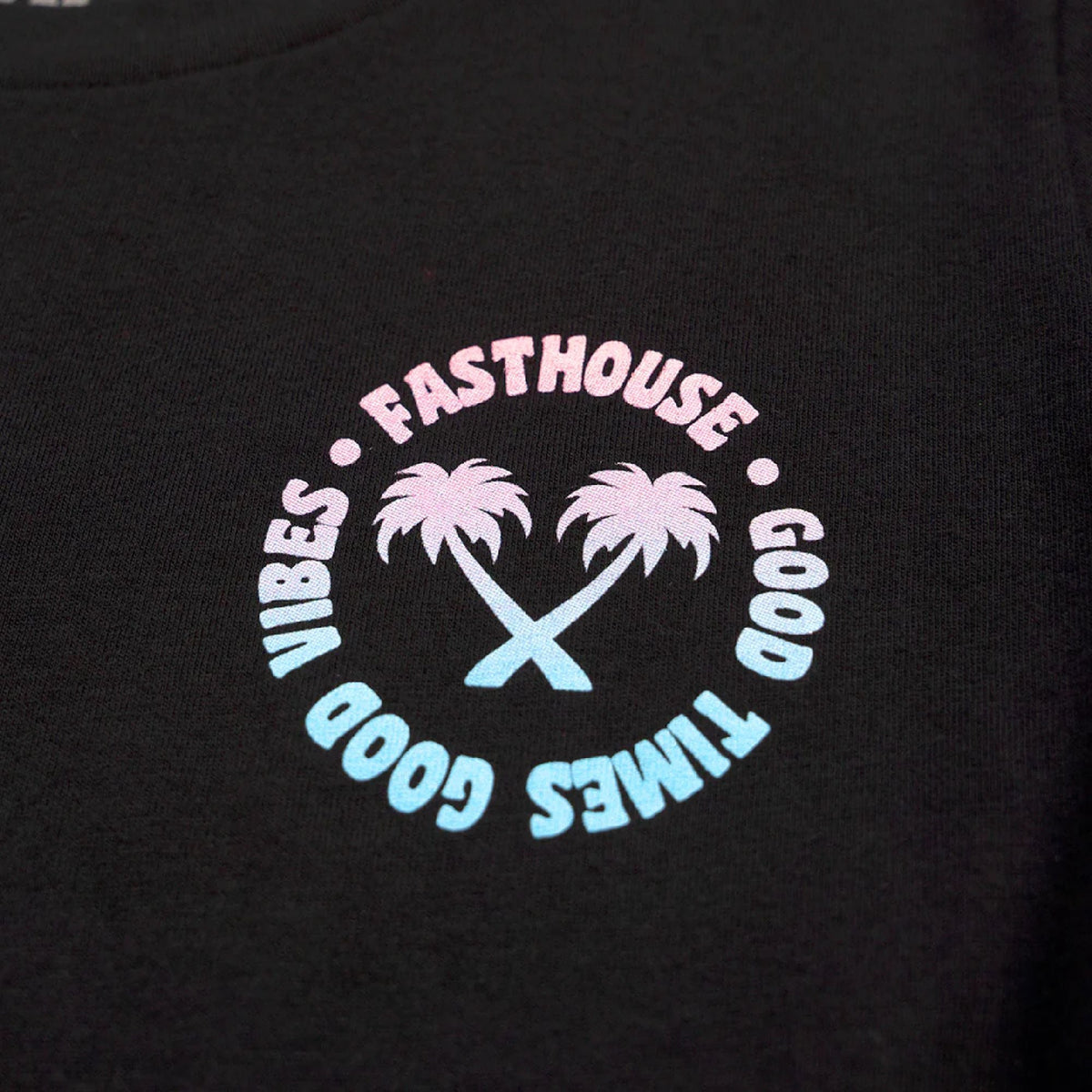 Girls' black short-sleeve tee close-up of Fasthouse logo with palm and cross.