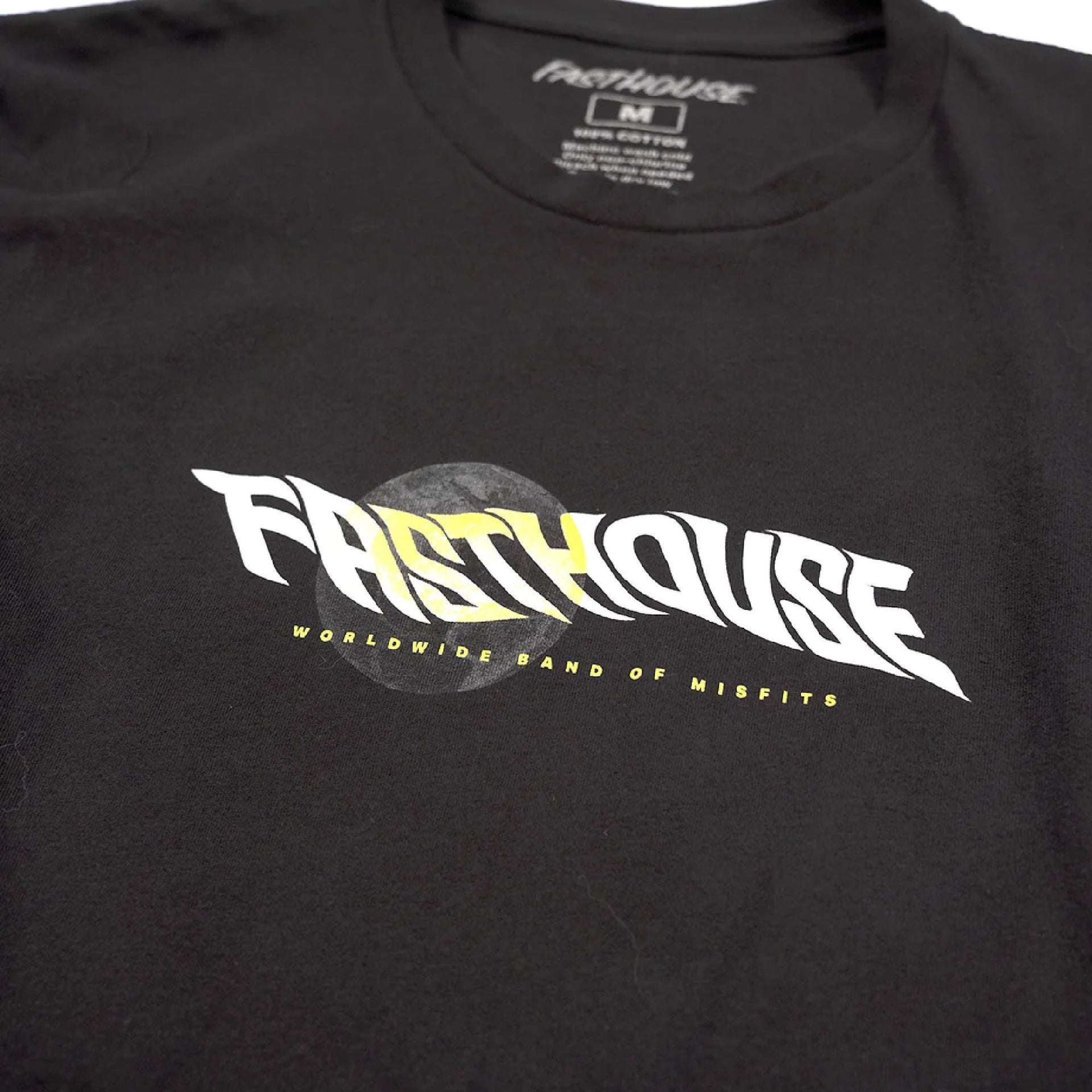Black short-sleeve T-shirt close-up of Fasthouse Glitch logo print