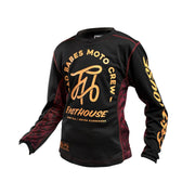 Girls' black long-sleeve motocross jersey with gold script graphic