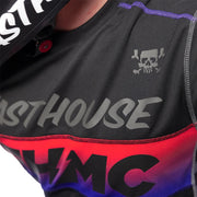 Black jersey top with Fasthouse logo, red-and-purple graphic stripe and contrast stitching