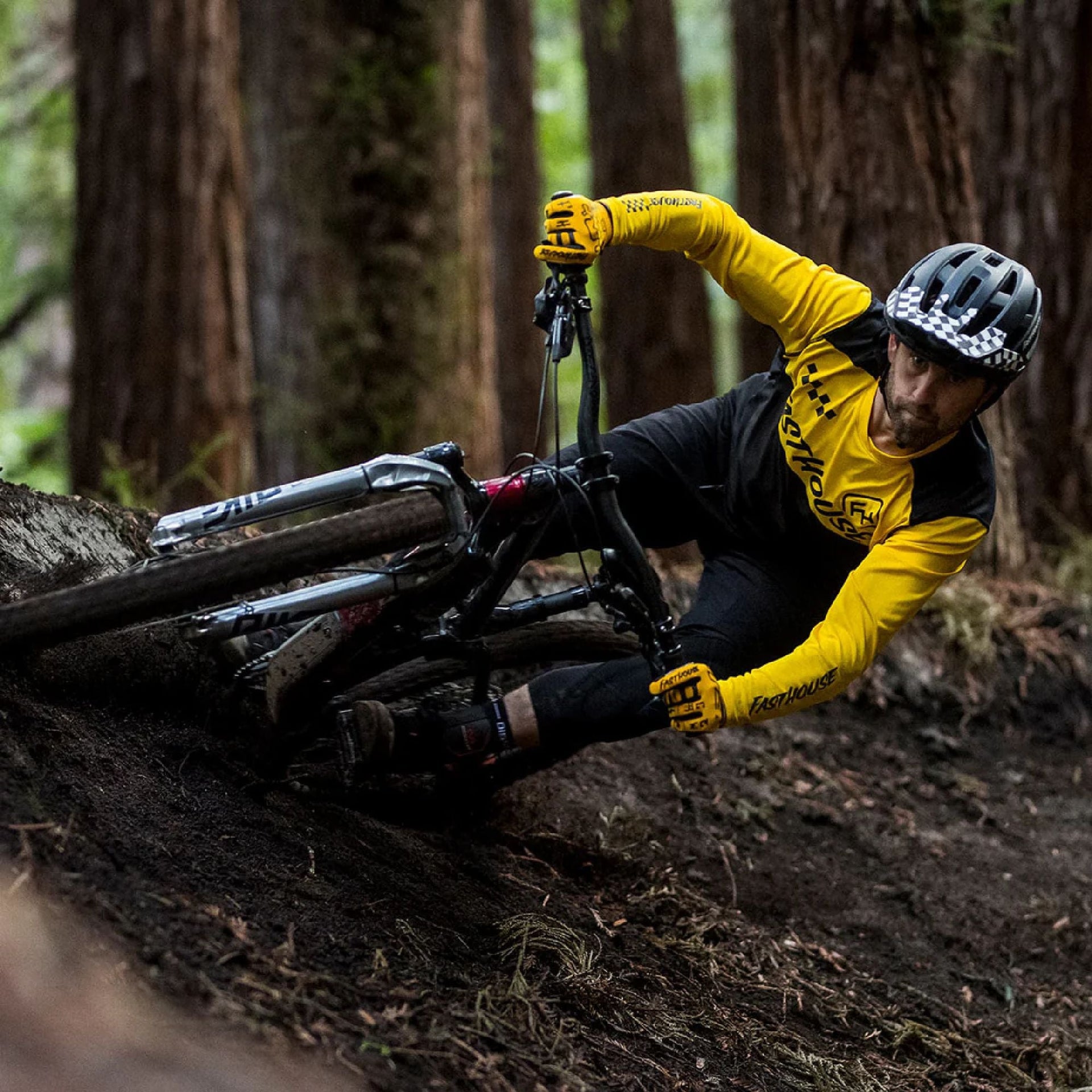 Alloy block jersey with yellow long sleeves and black body on a cyclist