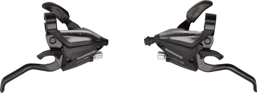 Black Shimano bicycle brake/shift lever set, dual levers with ergonomic grips