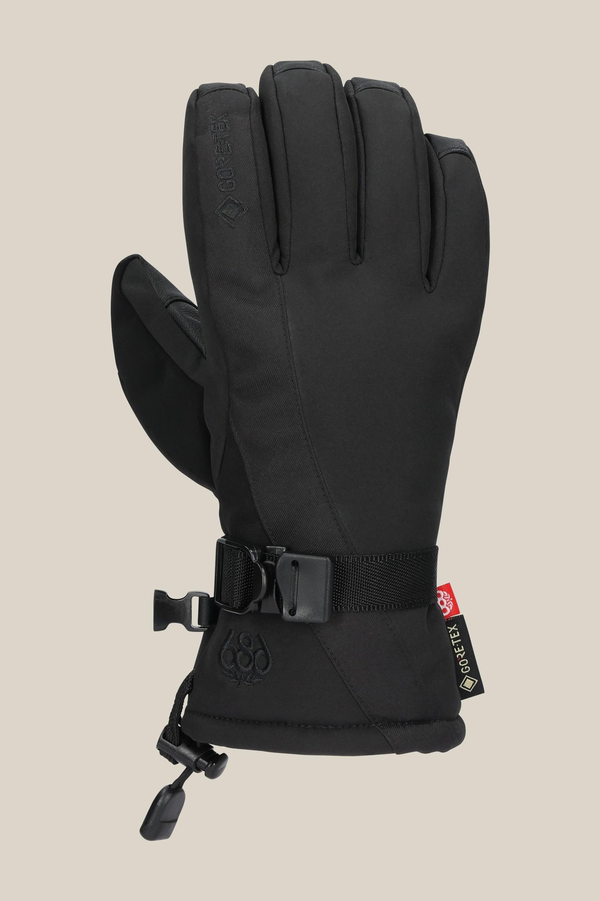 Women's GORE-TEX linear gloves in black with wrist strap and pull tabs