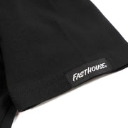 Black T-shirt sleeve cuff with FASTHOUSE® logo tag