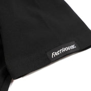 Black T-shirt sleeve hem with Fastthouse logo patch