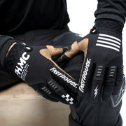 Off-road motocross gloves, black with tan palm and white wrist stripes