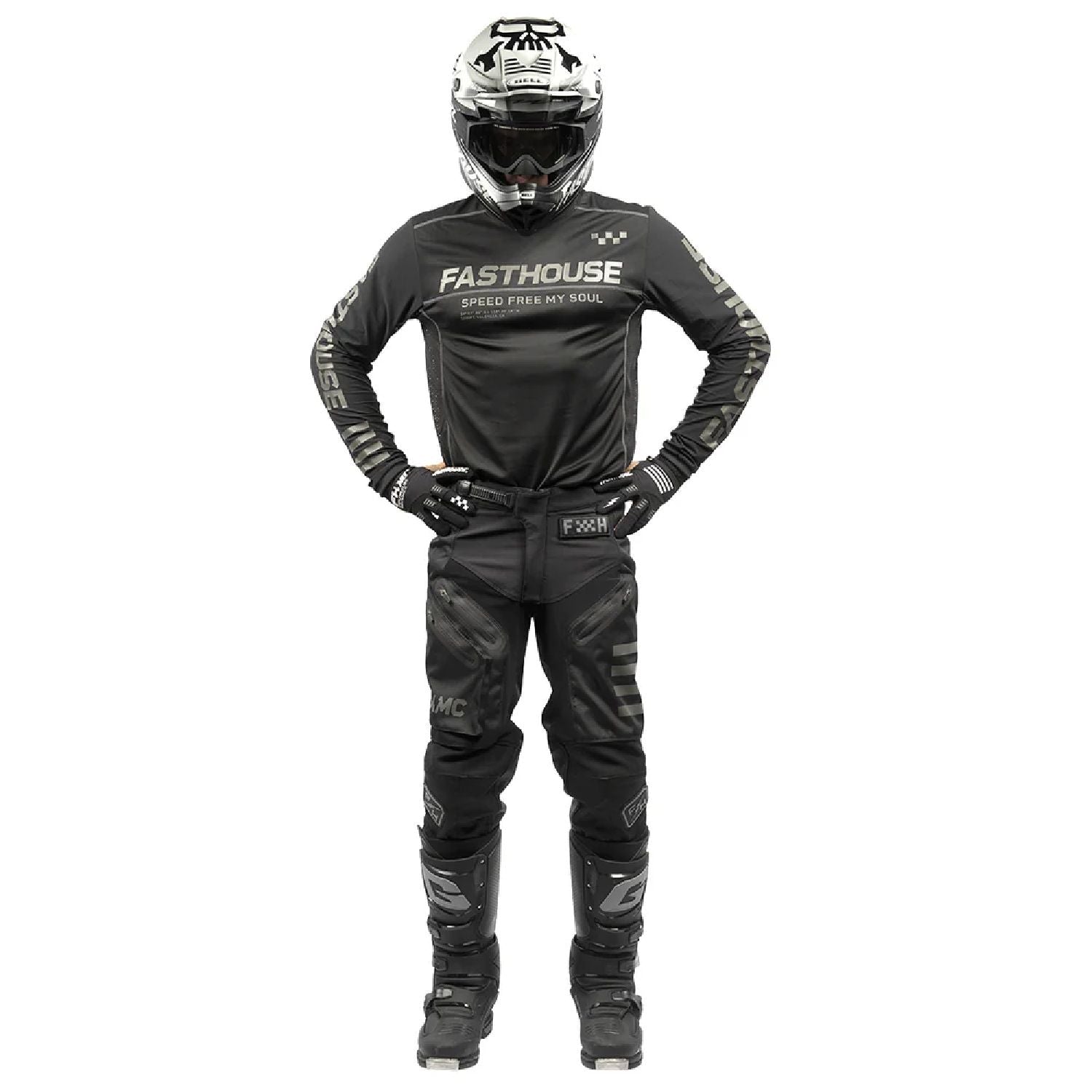 Black off-road long-sleeve jersey with FASTHOUSE chest logo, worn with riding gear