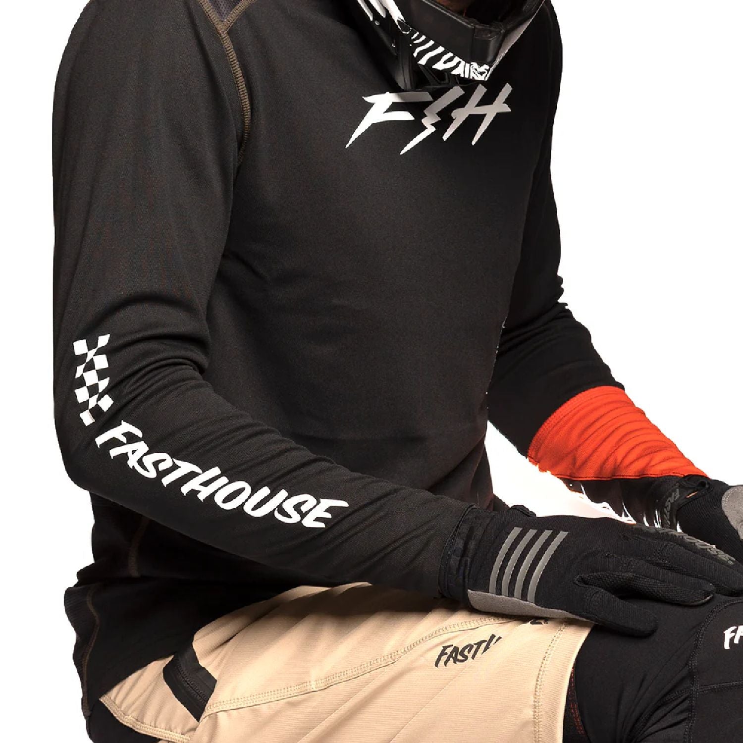 Black long-sleeve motocross jersey with white logos and orange cuff panels