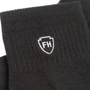 Black ankle performance sock cuff with white FH crest
