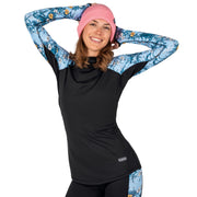Women’s black hooded long-sleeve baselayer top with bright blue patterned sleeves